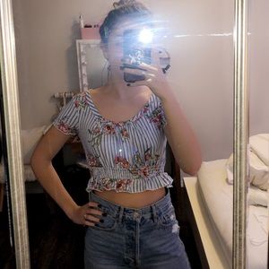 This is a crop top, white, blue, floral!